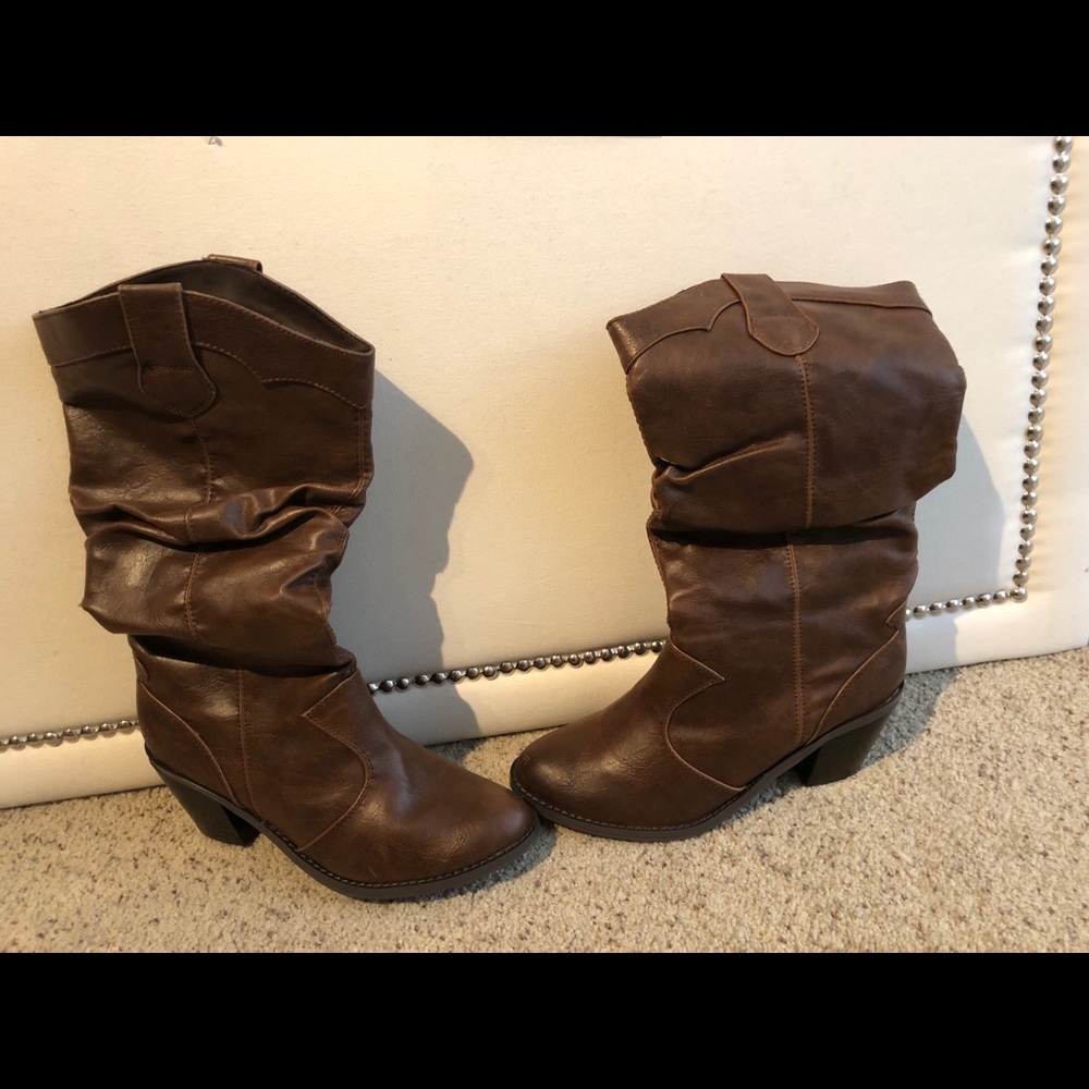 New brown cowboy boots will a heel